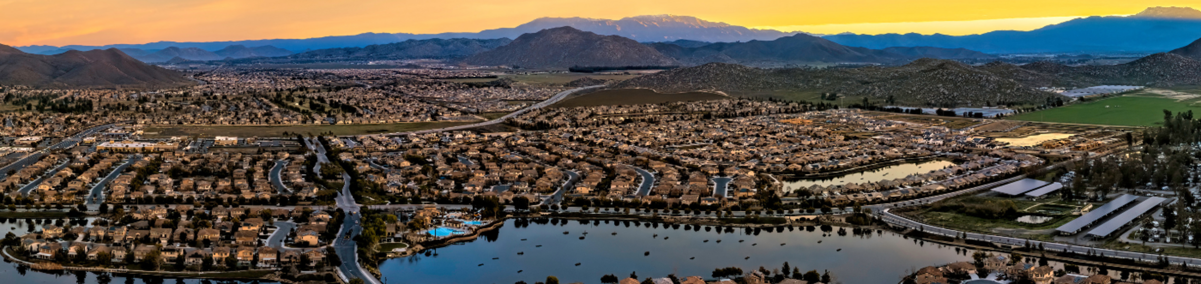 Sunset view with a neighborhood and river