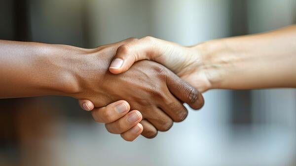 Two people shaking hands
